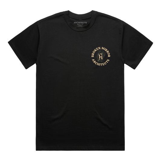 Black T-shirt with a round ‘Broken Mirror Architect’ logo across the right-hand side of the chest.