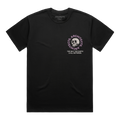 Black short-sleeve t-shirt with a skull graphic on the right side of the chest, surrounded by pink “Architects” text, and white text underneath that reads “The Sky, The Earth & All Between.”